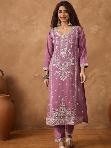 Kurta with thread embroidery paired with trousers with embroidered hem and booti embroidered dupatta